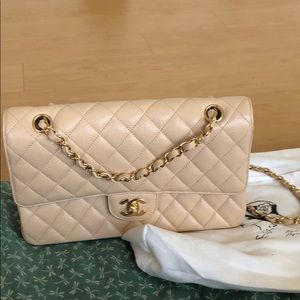 New cream Chanel caviar bag with gold barely used